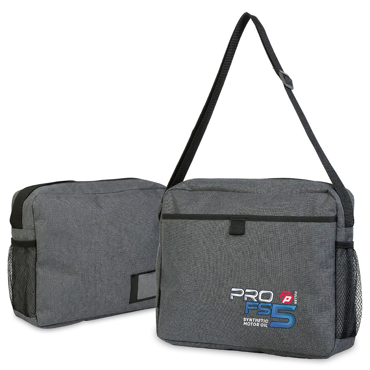 A grey satchel bag with an adjustable strap, featuring a front pocket and mesh side pockets. Includes a logo. Tirano Satchel - Image 1