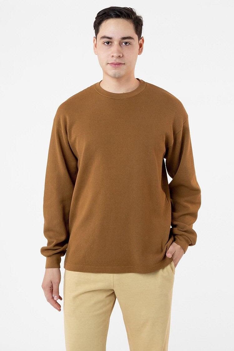A brown heavy thermal crewneck sweater worn by a model, featuring a relaxed fit and long sleeves. Garment Dye Heavy Thermal Crewneck - Image 1