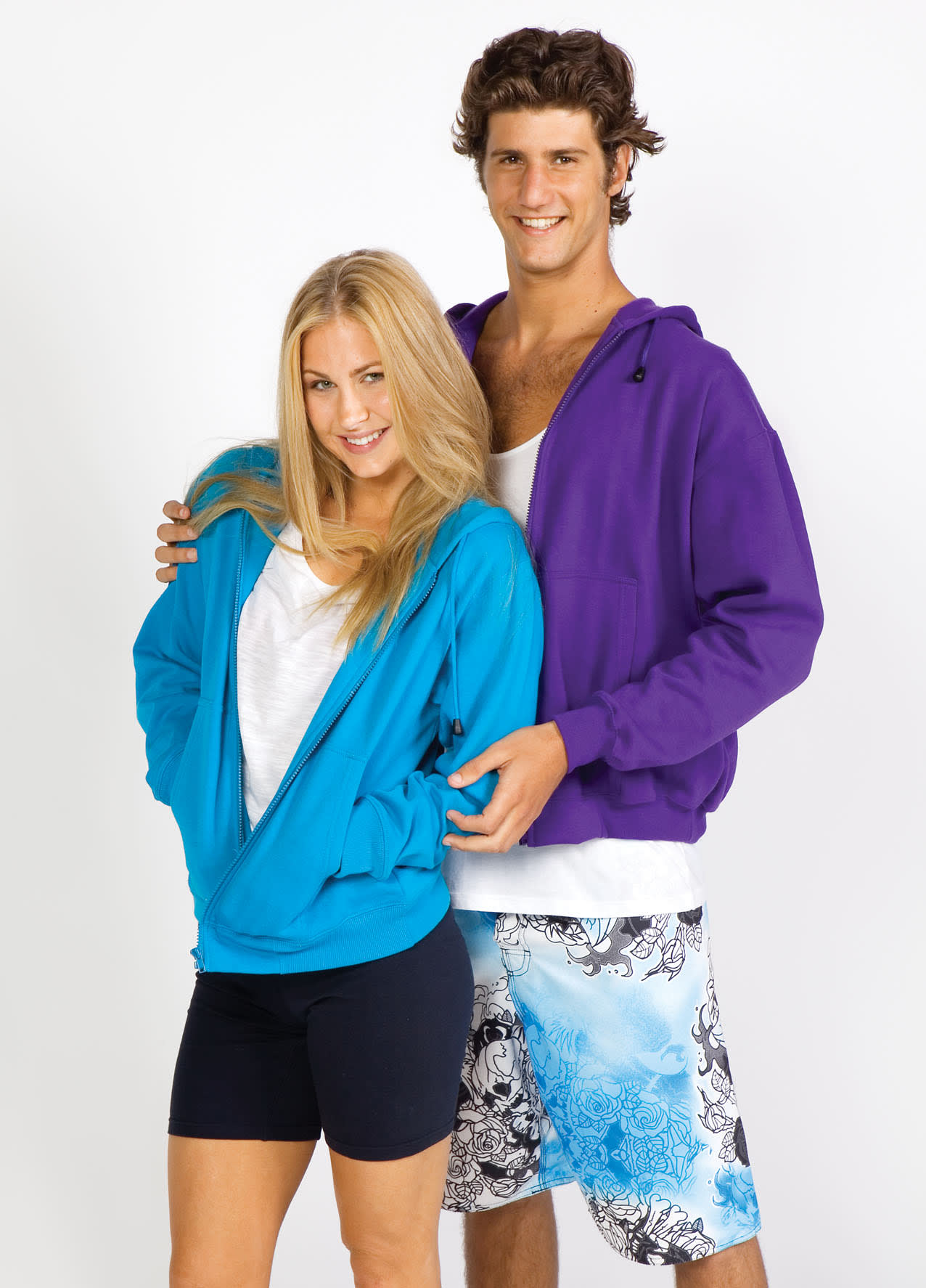 A purple zip hoodie worn by a male model and a blue zip hoodie worn by a female model, both with pockets. Mens Zip Hoodies with Pocket - Image 1