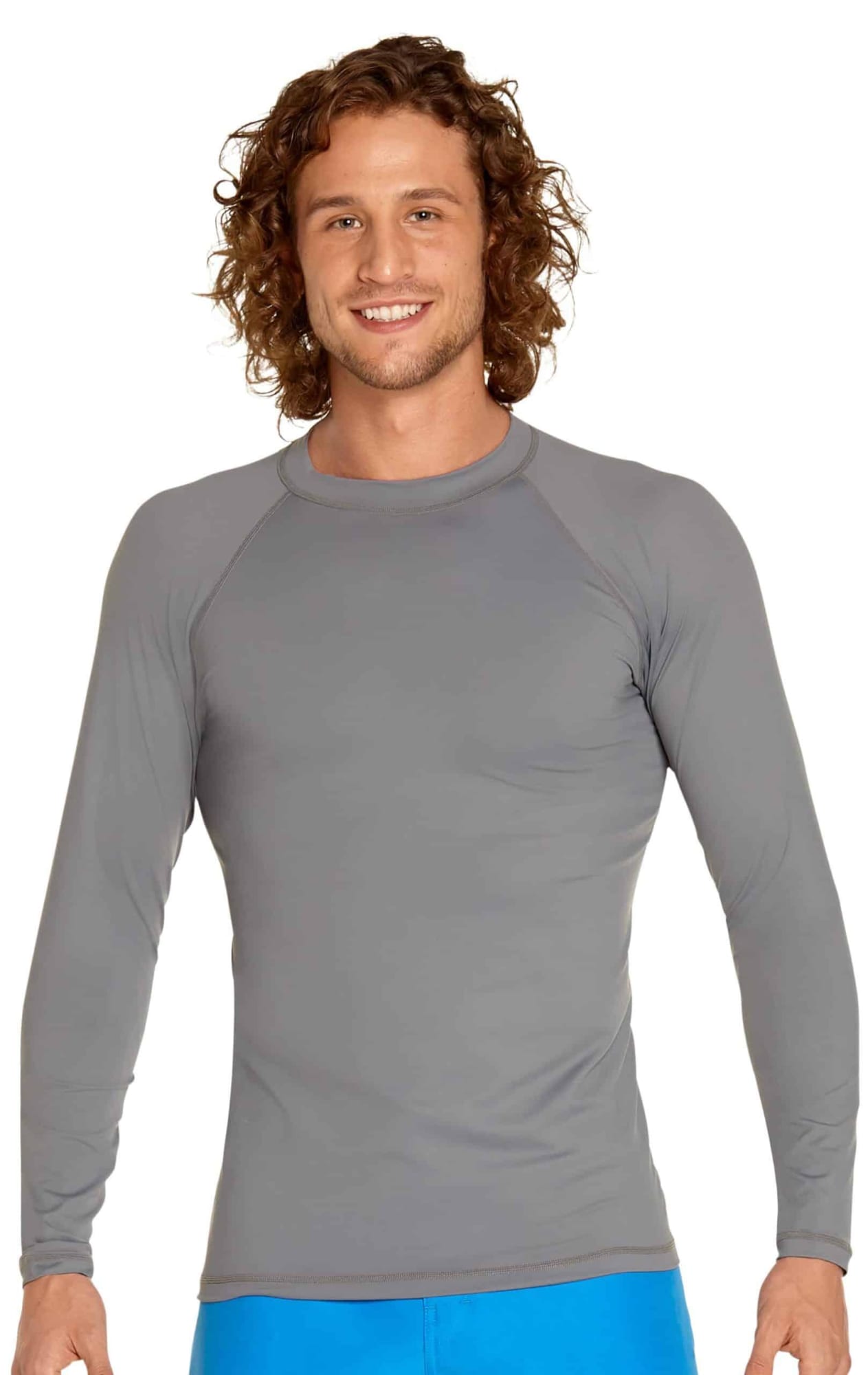 A man wearing a grey long sleeve rashie with a fitted design. The garment features a round neckline and long sleeves. Adult Long Sleeve Rashie UPF 50+ - Image 1