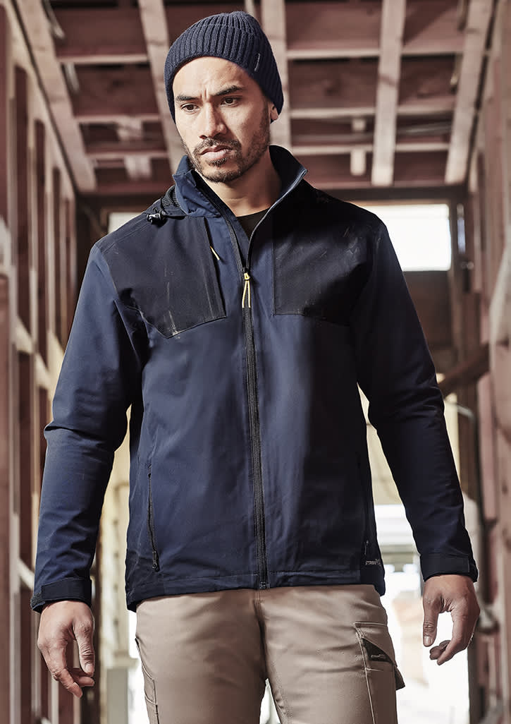 A navy unisex waterproof jacket with a zip front, featuring a logo and a fitted design. Unisex Streetworx Stretch Waterproof Jacket - Image 1