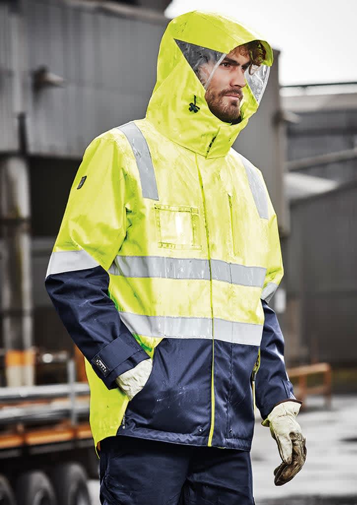 A waterproof jacket in high visibility yellow and navy, featuring reflective strips and a hood. It has a logo. Mens Hi Vis 4 In 1 Waterproof Jacket - Image 1