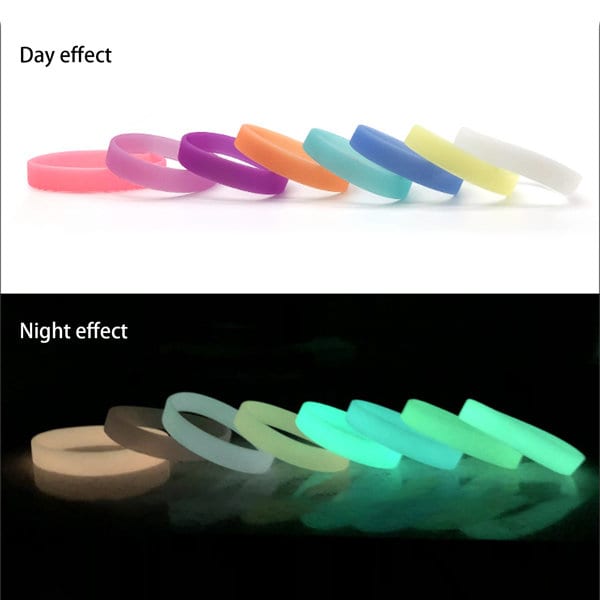 A selection of luminous silicone rubber wristbands in various colours, displaying their day and night effects. Custom Luminous Silicone Rubber Wristband - Image 1