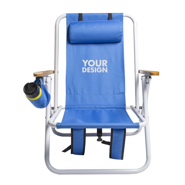 A blue portable backpack beach chair with a cup holder and a logo. It features a padded headrest and wooden armrests. Portable Backpack Beach Chair - Image 1