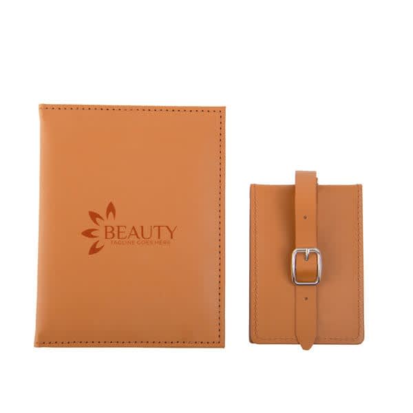 A tan PU leather luggage tag and passport holder set featuring a logo. Both items have a sleek, minimalist design. PU Leather Luggage Tag Passport Holder Set - Image 1
