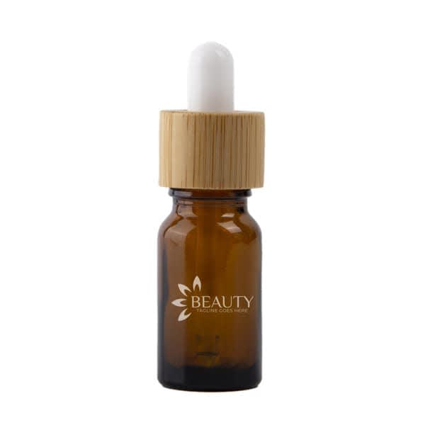 A glass dropper bottle in amber with a bamboo lid and a white dropper, featuring a logo. 15ml Glass Dropper Bottle With Bamboo lid - Image 1