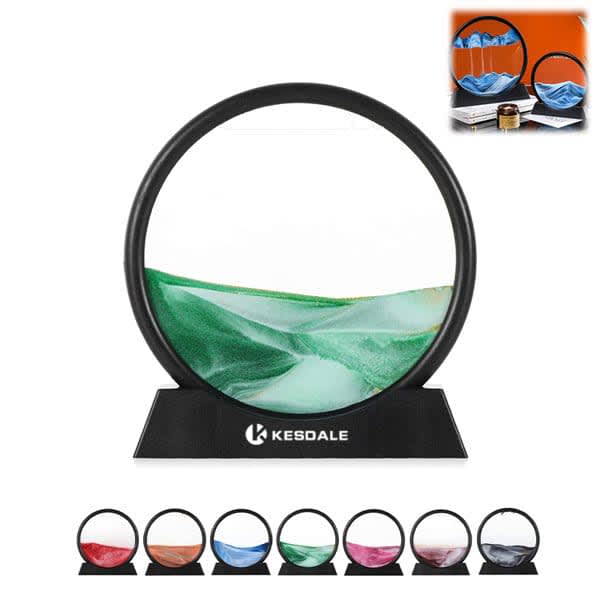 A circular, black-framed 3D quicksand painting with green and blue sand, displayed on a black base. 3D Quicksand Painting - Image 1