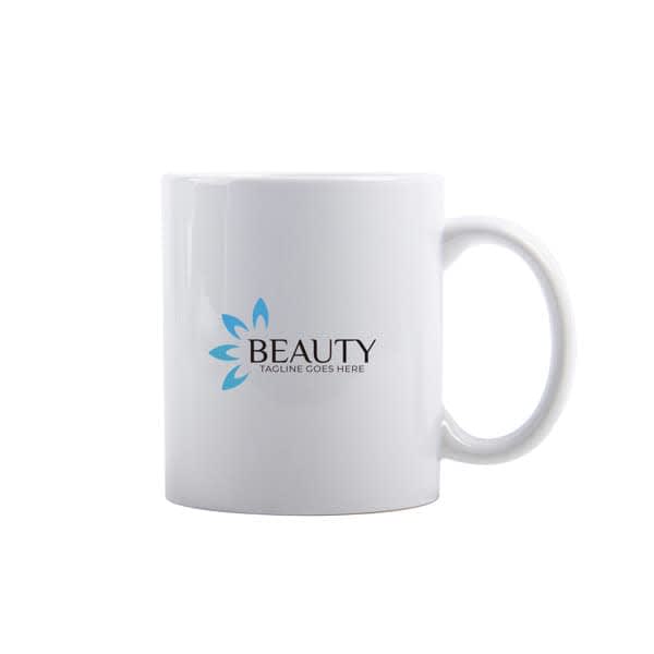 A white ceramic mug with a handle featuring a logo and blue floral design. 11 oz. Handle Ceramic Mug - Image 1