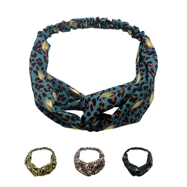 A criss-cross headband featuring a teal base with a leopard print design and three additional patterns in different colours. Women Criss Cross Headband - Image 1