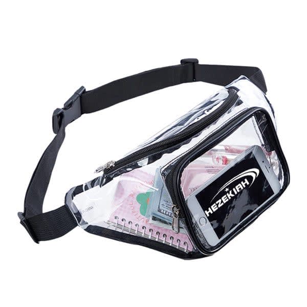 A clear waterproof fanny pack with a black strap, featuring a front zip pocket and space for a phone, money, and cards. Waterproof Clear Fanny Pack - Image 1