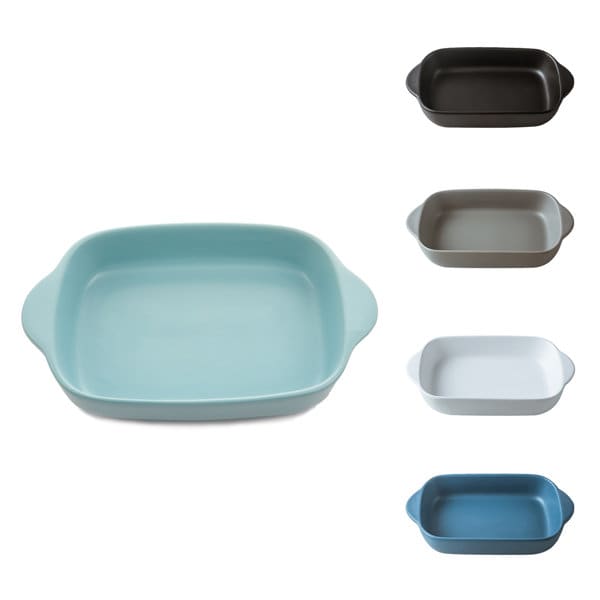 A ceramic baking pan in a light blue colour, surrounded by four other baking pans in various shades of black, grey, and white. Binaural Ceramic Baking Pan - Image 1