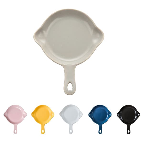 A round matte ceramic baking dish with a handle, displayed in various colours: pink, yellow, white, blue, and black. Round Matte Ceramic Baking Dish With Handle - Image 1