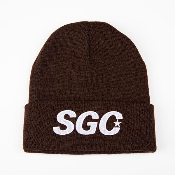 A brown knit cuffed beanie with an embroidered logo, featuring a fold-up cuff design. Embroideried Knit Cuffed Beanie - Image 1