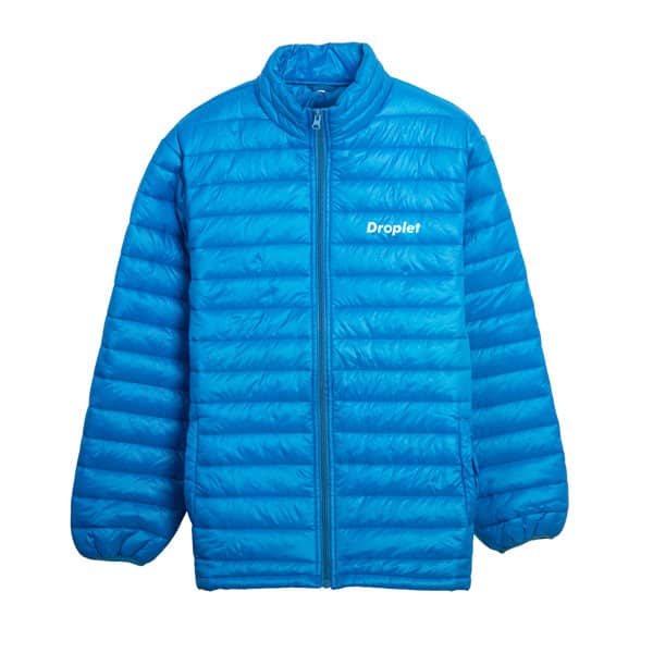 A blue jacket with a quilted design and a logo on the front. Features a zip-up front and stand-up collar. Fiber Fill Jacket - Image 1