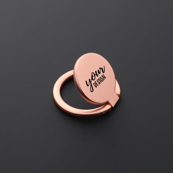 A rose gold metal finger ring holder for mobile phones featuring a customisable design area and a circular shape. Mobile Phone Metal Finger Ring Holder - Image 1