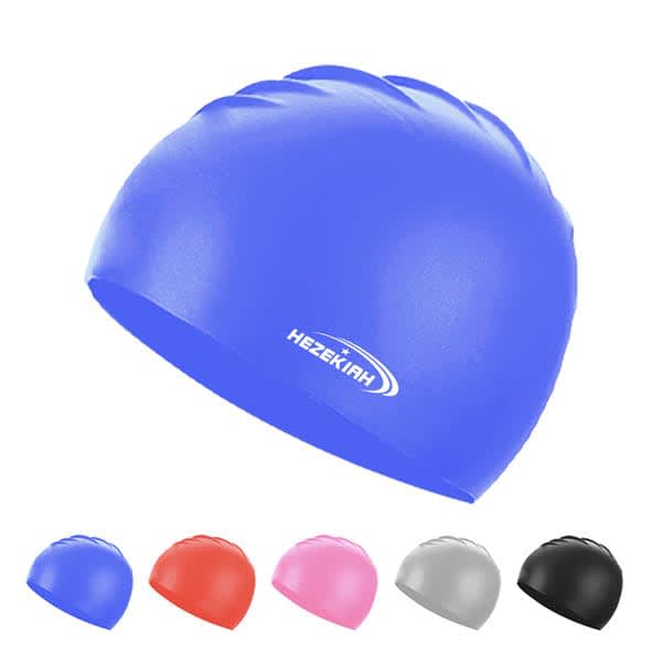 A silicone swimming cap in blue with a logo, alongside caps in red, pink, grey, and black. Silicone Swimming Cap - Image 1