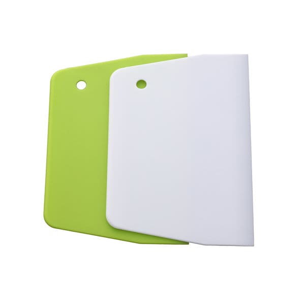 Two plastic baking dough scrapers in green and white, with a rounded edge and a hole for hanging. One has a branding logo. Plastic Baking Dough Scraper - Image 1