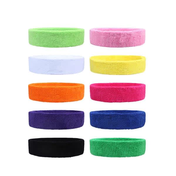 A variety of Terry Cotton Sports Headbands in green, pink, white, orange, purple, blue, black, and more. Each has a soft, fluffy texture. Kids Terry Cotton Sports Headband - Image 1