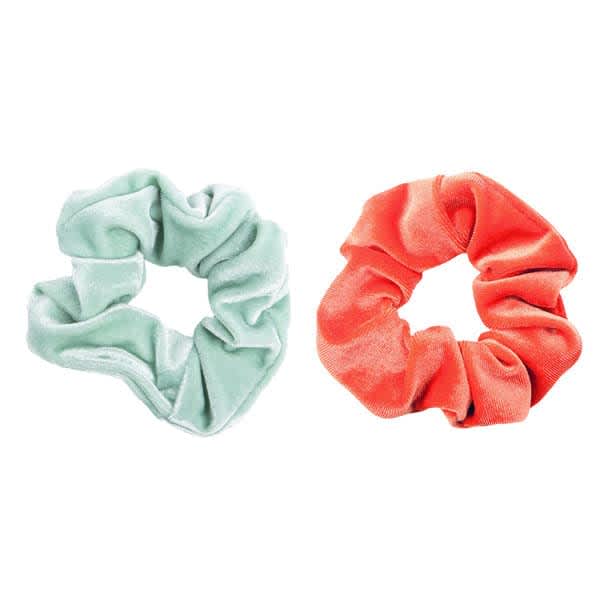 A green and an orange velvet hair scrunchie are displayed side by side, featuring a soft, textured fabric. Velvet Hair Scrunchie - Image 1