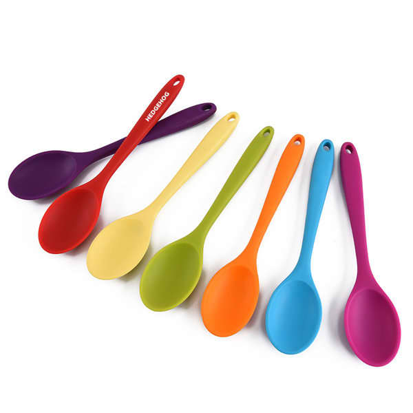 A set of seven heat-resistant silicone spoons in various colours: purple, red, yellow, green, orange, blue, and pink. Custom Heat Resistant Silicone Spoon - Image 1