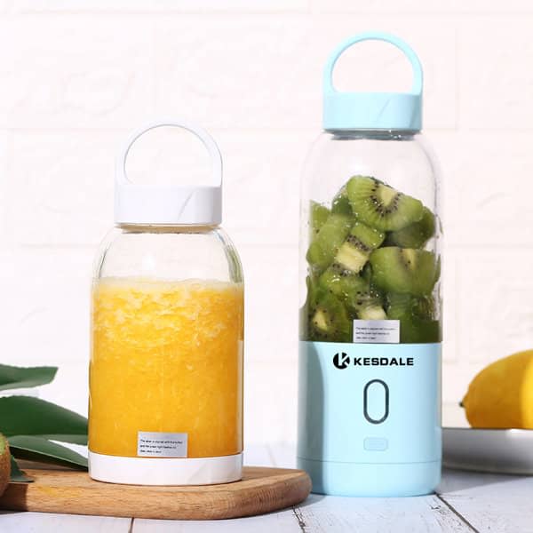 A drink bottle with a light blue lid and base, featuring a logo, alongside a clear bottle with orange beverage and green fruit. Portable Personal Blender For Shakes - Image 1