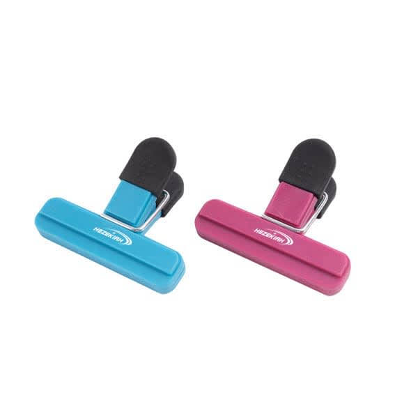 A set of two large plastic chip bag clips in turquoise and pink, featuring a black handle and branding. Custom Large Plastic Chip Bag Clip - Image 1
