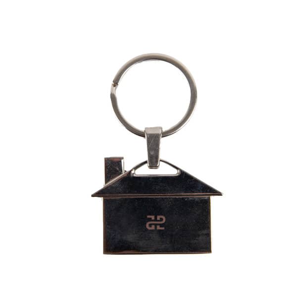 A silver house-shaped keychain with a metal ring. The keychain features a small chimney detail. Custom Zinc Alloy House Shaped Keychain - Image 1