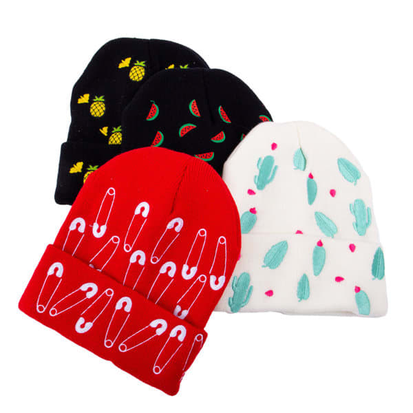 A collection of four cuffed beanies in red, black, white, and pink, featuring various playful patterns and designs. Cute Design Cuffed Beanie - Image 1
