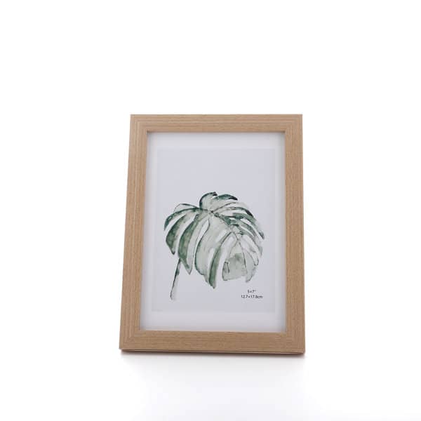A personalised 7-inch photo frame in natural wood, displaying a botanical print of a leaf. Simple Personalized 7 inch Frame - Image 1