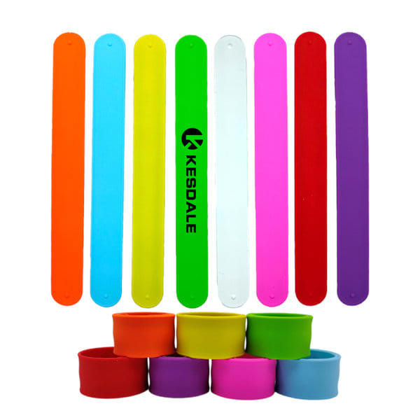Brightly coloured silicone slap bracelets in orange, blue, green, pink, red, white, and purple, with a logo on one bracelet. Kids Silicone Slap Bracelet - Image 1