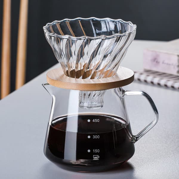 A coffee filter pot with a glass body, a wooden base, and a ribbed glass filter on top. 600ml Coffee Filter Pot - Image 1