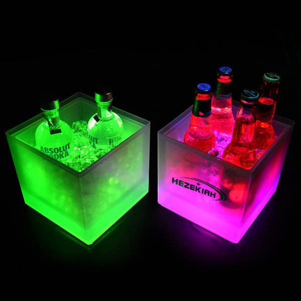 A colourful LED ice bucket containing bottles, illuminated in green and pink, with ice and some drinks visible. 3.5L Colorful LED Ice Bucket - Image 1
