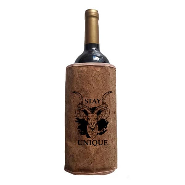 A drink bottle wrapped in a cork material featuring a design with a goat and the words "Stay Unique." Cork Wine Cooler Bottle Wrap - Image 1