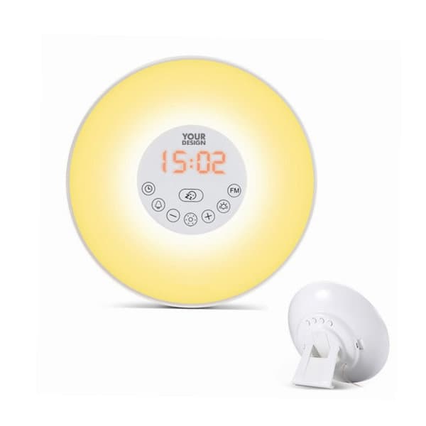 A round, yellow wake-up light digital alarm clock with a white base and control buttons on the front. Smart Wake Up Light Digital Alarm Clock - Image 1