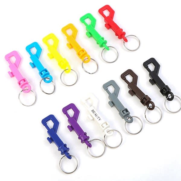 A variety of plastic snap hooks in multiple colours, each with a key ring attachment. Plastic Snap Hook With Key Ring - Image 1