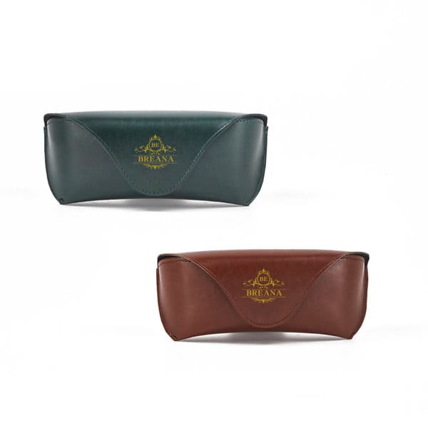 A PU leather sunglasses case in green and brown, featuring a logo on the front. PU Leather Soft Sunglasses Case - Image 1