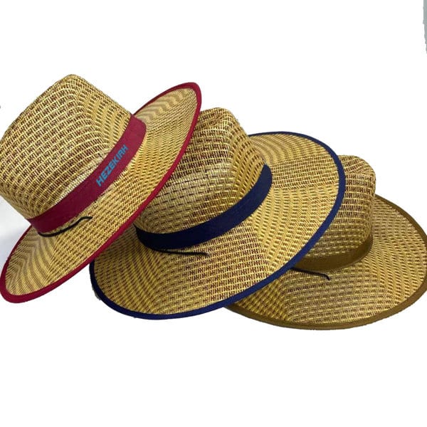 A wide brim cowboy straw hat in shades of beige with contrasting bands in red, navy, and olive green. Wide Brim Cowboy Straw Hat - Image 1