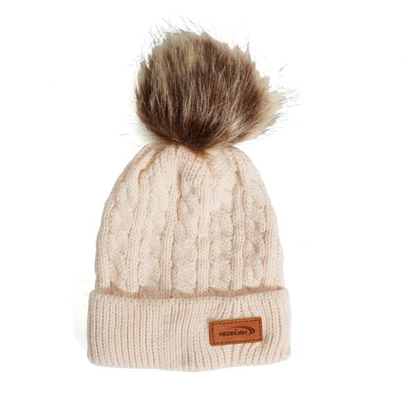 A cream beanie with a knitted pattern and a plush fox fur pom pom on top, featuring a small logo tag. Fox Fur Pom Beanie - Image 1