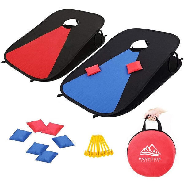A portable cornhole board game set featuring black and red boards, blue bags, and yellow stakes in a round carrying bag. Portable CornHole Boards Game Set With One Cornhole - Image 1