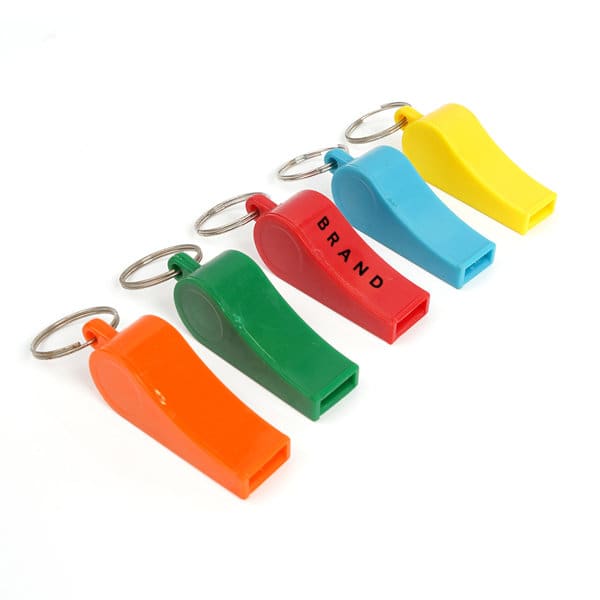 A set of five plastic sports whistles in orange, green, red, and yellow, attached to keyrings, with one featuring a logo. Plastic Sports Whistle - Image 1