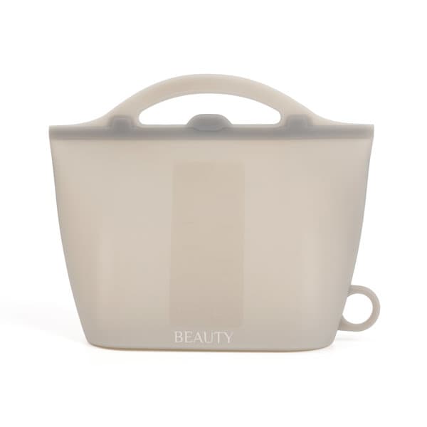 A reusable silicone food storage bag in a light beige colour with a handle and a loop for easy carrying. Reusable Silicone Food Storage Bag - Image 1