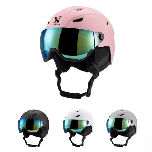 A pink ski helmet with a large reflective lens, accompanied by black, white, and grey helmets with similar lenses. Ski Helmet With Lens - Image 1