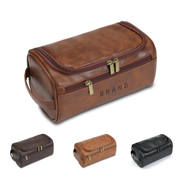 A portable PU leather toiletry bag in brown, featuring a zip closure and a branded logo on the front. Portable PU Leather Toiletry Bag - Image 1