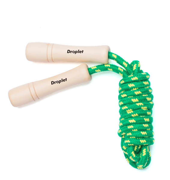 A skipping rope featuring wooden handles and a green and yellow patterned rope. The product has a branding logo. Wooden Handle Cotton Skipping Rope - Image 1