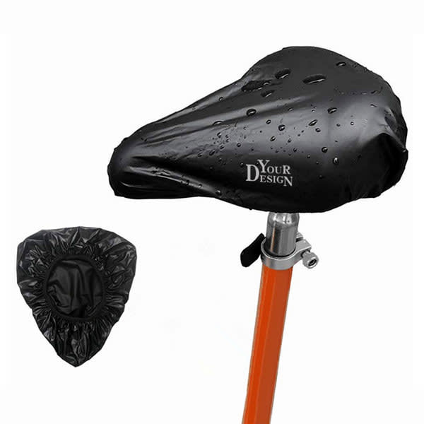 A waterproof bike saddle cover in black, displayed over a saddle with droplets of water, featuring a logo. Waterproof Bike Saddle Cover - Image 1
