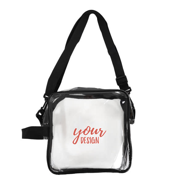 A clear PVC crossbody bag with a black strap and a white insert displaying a design. It has a logo on the front. PVC Clear Crossbody Bags - Image 1