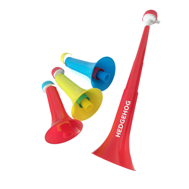 A set of four plastic stadium horns in red, yellow, and blue, featuring a logo on one horn. Plastic Retractable Stadium Horn - Image 1