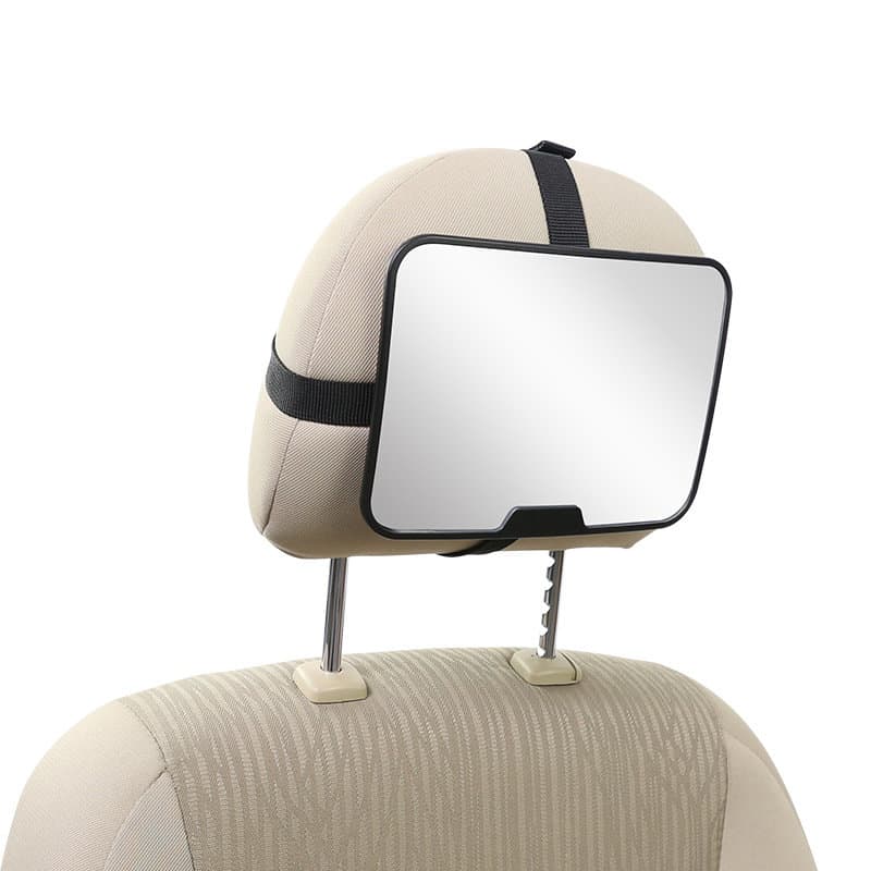 A backseat baby car mirror in black, attached to a beige headrest, featuring a rectangular reflective surface. Backseat Baby Car Mirror - Image 1