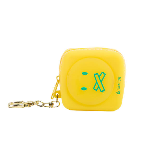 A square yellow silicone coin purse with a keychain, featuring a simple smiley face design and a logo. Silicone Coin Purse With Keychain - Image 1