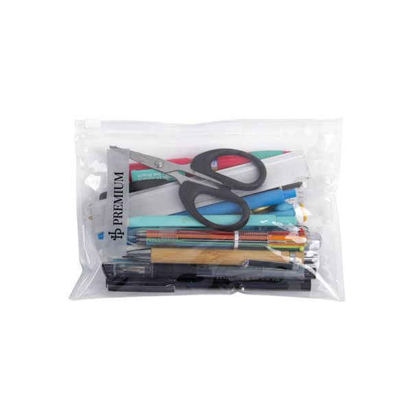 A clear zip lock bag containing scissors, pens, pencils, highlighters, and various stationery items. Clear Slider Zip Lock Bag - Image 1